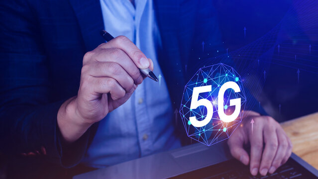 5G network concept, Business using with holographic digital globe with interconnected 5G symbols, 5G technology in modern business and communication, digital transformation.