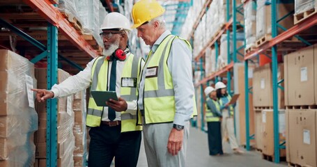 Warehouse, team and package inspection with tablet for quality control, order accuracy or shipping. Logistics manager, tech and mature men in factory with label info, cargo distribution and inventory