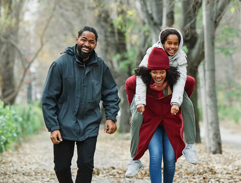 Family having fun playing outdoors