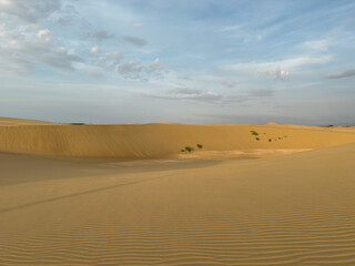 Desert travel background with rolling sun-drenched sand dunes - Coro, Venezuela