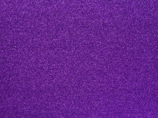 Purple glitter background. Violet sparkle background. Purple glimmer. Abstract twinkle texture. Glitter violet surface. Glimmer layout. Holiday layout. Diamond luxury surface. Celebration background.