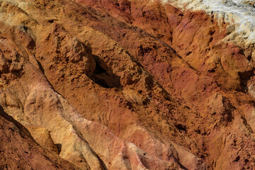 Colorful Mineral Striations in the Eroded Hills of Mazarron Mines, Murcia, Spain