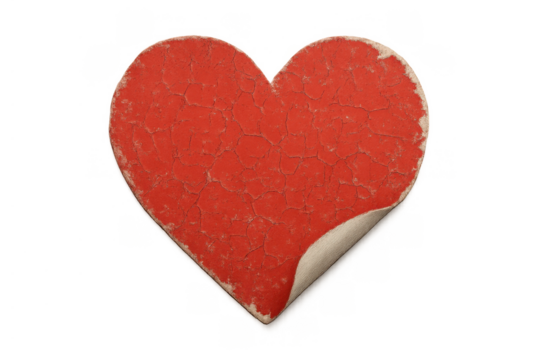 Heart shape sticker peeling, showing old red cracked texture and vintage romantic love concept