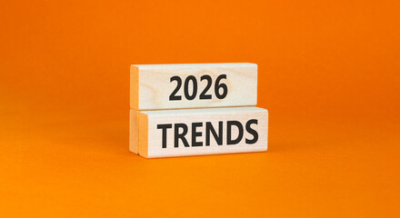 2026 Trends new year symbol. Concept words 2026 Trends on beautiful wooden blocks. Beautiful orange paper background. Business and 2026 Trends new year concept. Copy space.