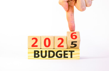 2026 Budget symbol. Concept words 2026 Budget on beautiful wooden blocks. Beautiful white paper background. Businessman's hand. Business and 2026 budget concept. Copy space.