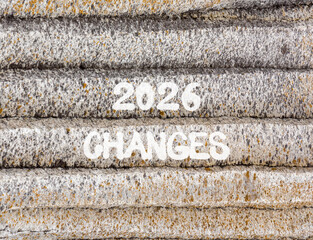 2026 Changes symbol. Concept words 2026 Changes on beautiful grey mountain wall. Beautiful grey mountain wall background. Business and 2026 changes concept. Copy space.