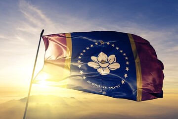 Mississippi state of United States new flag textile cloth fabric waving on the top sunrise mist fog
