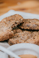 A plate of cookies with one cookie missing