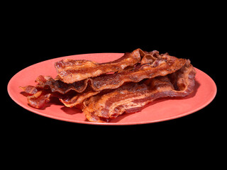 Cooked Crispy Bacon on a Red Plate