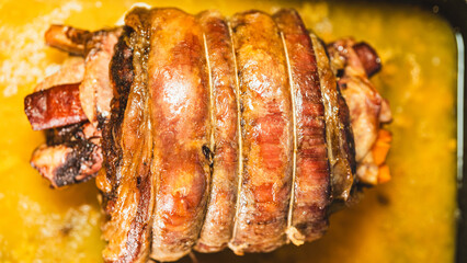 Juicy stuffed beef ribs with calabrese sausage, bacon and vegetables. Golden brown and perfectly...