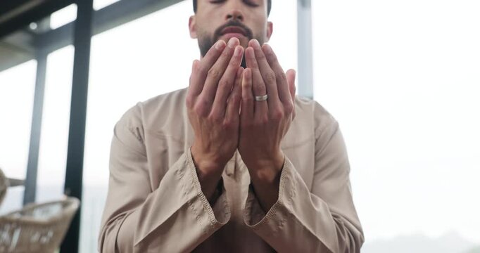 Below, muslim and praying with man at house for gratitude, islamic faith and worship Allah on Eid. Male person, prayer and dua with spiritual belief, religious devotion and praise to God of tradition