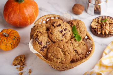 Cookies with pumpkin, walnuts and dark chocolate. Delicious homemade dessert.