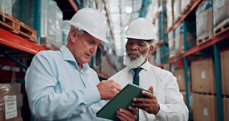 Tablet, logistics and men in warehouse with inventory, inspection or stock quality assurance. Digital technology, discussion and mature supply chain employees with checklist for shipping information - Powered by Adobe