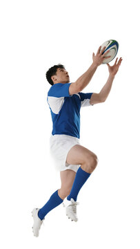 A male rugby player in action, jumping to catch a rugby ball during a game.