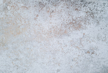 An abstract gray background with silver spots on the surface. Space for creative text, advertising, or congratulations. Copy space 