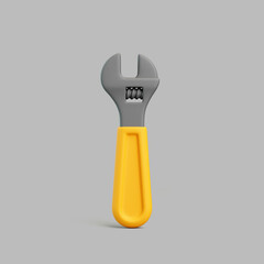 Yellow Adjustable Wrench Isolated on Gray Background
