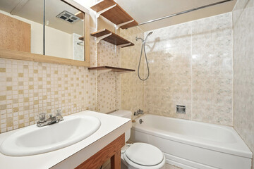 Bathroom with a white sink and toilet