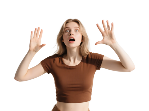 A young woman with raised hands showing a surprised expression against a white background. - Powered by Adobe