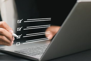 Businessman tick correct sign mark for document approve , project acceptance and quality assurance concept, Take an assessment, questionnaire, evaluation, online survey online exam.