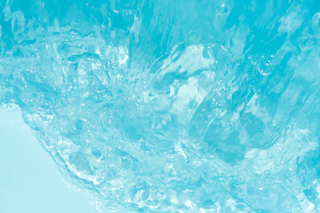 Blue water with ripples on the surface. Defocus blurred transparent blue colored clear calm water...