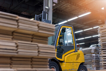 Wood industry warehouse with packaged laminate boards