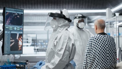 Researcher in a medical laboratory monitoring a patient with viral disease symptoms, collecting diagnostic data and studying immune reactions to improve healthcare prevention strategies. Camera B.