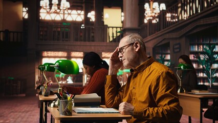 Aged performer engaged in dramaturgy and script practice with lines, demonstrating creativity and discipline during drama rehearsal. Passion for storytelling and reenactment.