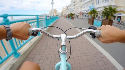 Candid travel moments cycling along coastal promenade in first person perspective