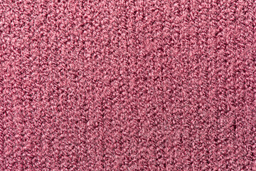 Burgundy fabric texture macro photo as background.