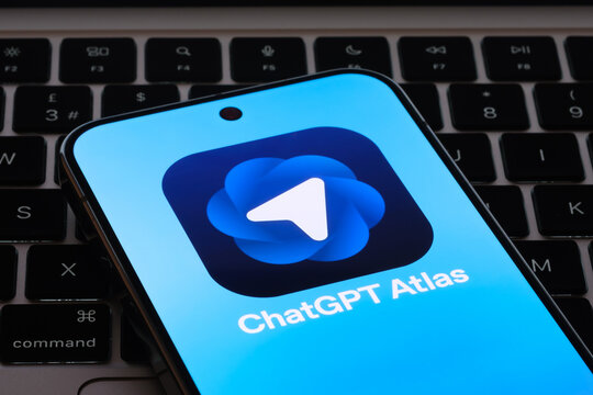 ChatGPT Atlas close up on phone over laptop keyboard macro product style photo. Stafford, United Kingdom, October 22, 2025