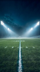 Football field at night bright stadium lights professional sports arena green grass texture background