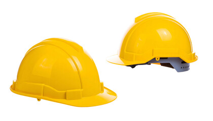 Two yellow construction hard hats isolated against a black background