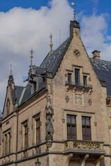 Beautiful aerial and detailed view of St. Vitus Cathedral in Prague Castle, Czech Republic, showcasing Gothic architecture, gargoyles, stained glass, and the historic city skyline.