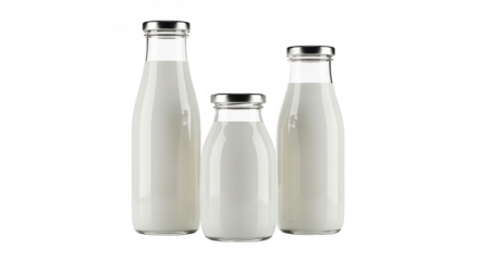 Three Glass Milk Bottles With Silver Caps Isolated On Black