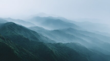 The mountains are covered in a thick layer of fog