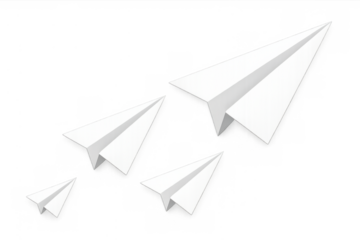 Paper airplanes flying in formation with a leader navigating forward, representing teamwork, ambition, and progress