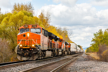 freight train in the autumn countryside in Montana