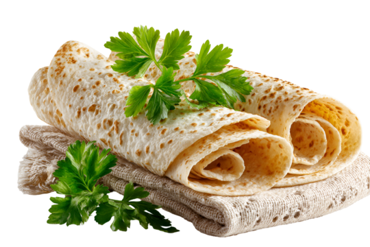 Freshly rolled flatbreads garnished with parsley