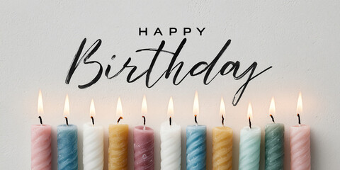 A festive Happy Birthday greeting card with a row of lit candles. The image evokes warmth, celebration, and joy. 