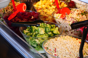 Colorful salad bar with fresh ingredients on display