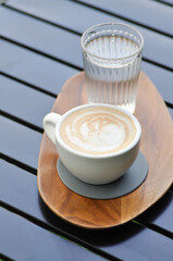 hot cofffee, cappuccino coffee or latte coffee or flat white and water