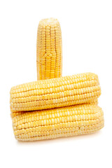Four peeled corn cobs on white background, vertical composition
