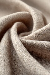Close-up macro shot of cotton fabric folds in soft neutral tones, showing fine weave texture and natural wrinkles, high-resolution textile background.