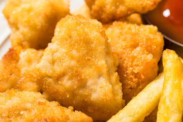 Healthy Breaded Chicken Nuggets and French Fries