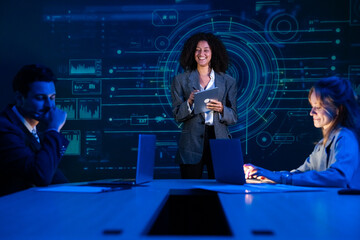 Diverse business team in a meeting, with a female leader presenting a global strategy on a large screen.