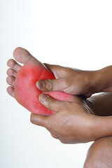 Soothing foot pain with a gentle massage for relief and wellness, helping to alleviate discomfort