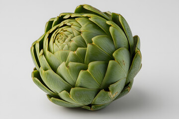 Fototapeta premium Fresh Whole Green Artichoke Perfect for Culinary Displays and Healthy Cooking Demonstrations