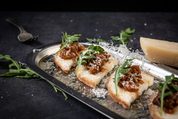 Savory Crostini Appetizers with Arugula and Parmesan Cheese