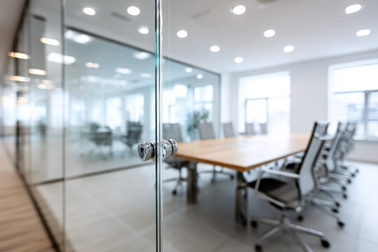 Minimalist glass office with blurred background for video conferencing