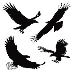Four black eagle silhouettes in flight on white background 1